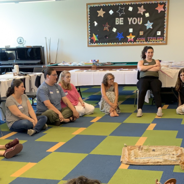Torah Godly Play educators working with Rabbi